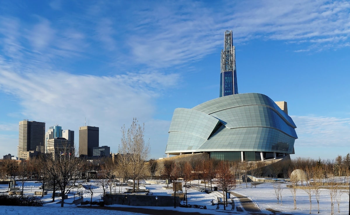 Winnipeg downtown cityscape. Winter view on Canadian Museum for Human Rights seen from The Forks park.