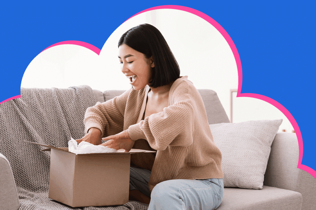 happy air miles customer opening a delivery purchase